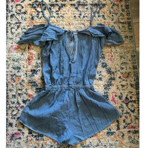 Denim-blue colored, off the shoulder romper. Perfect for spring & summer!